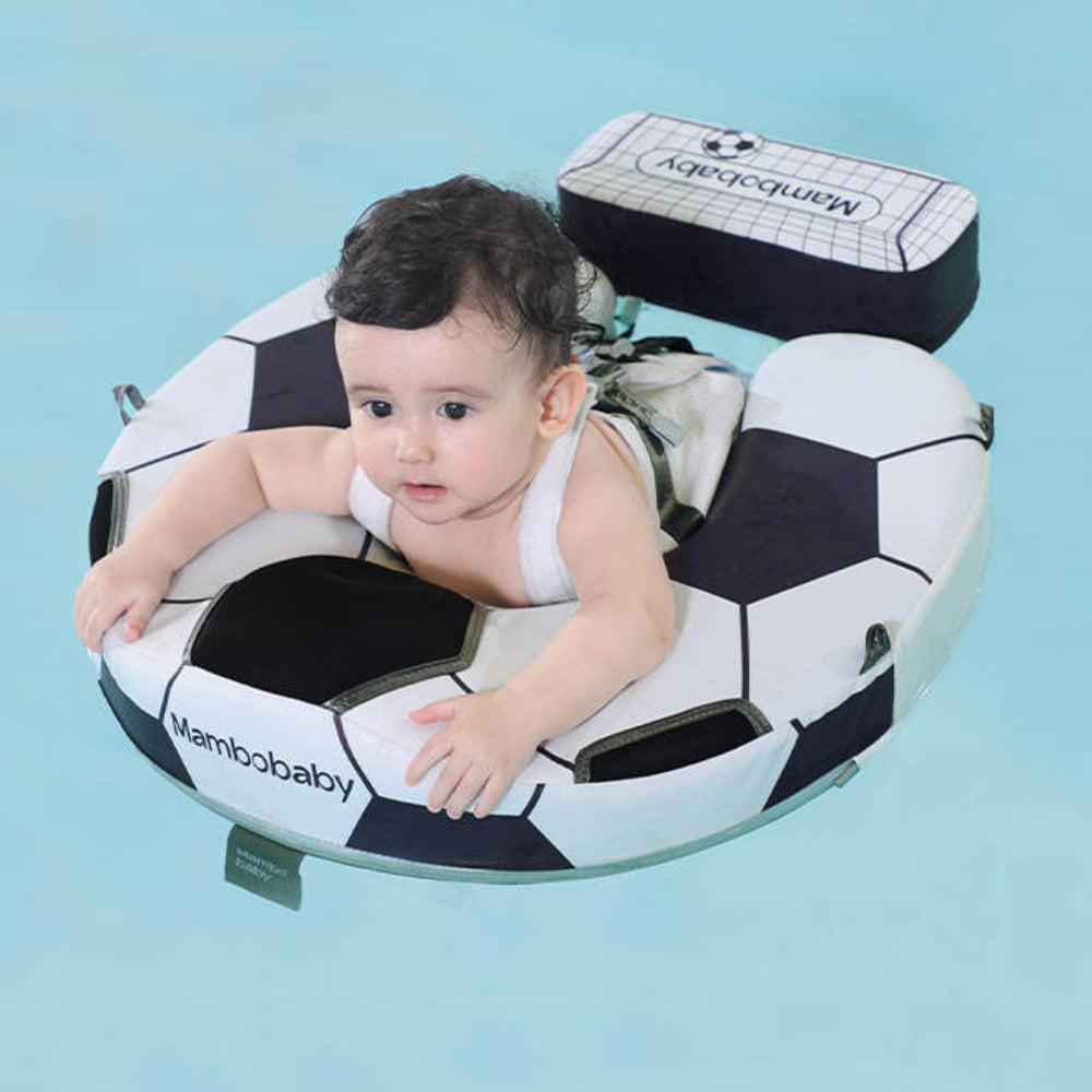 Infant in the Mambobaby Soccer float practicing breaststroke in a pool using the professional 40-degree safety angle.
