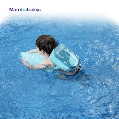 Child practicing natural swimming positions using the Mambobaby back float to promote core balance and kicking skills.