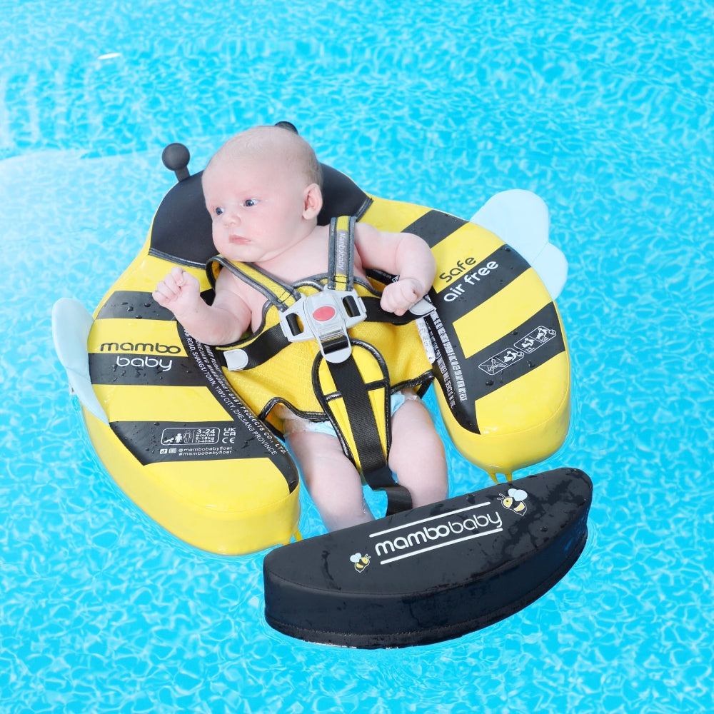 Infant swimming in a pool using the Mambobaby Bee float with a 40-degree professional horizontal safety angle.