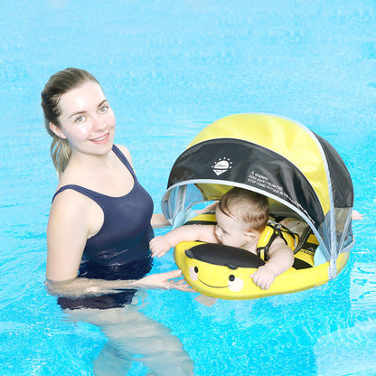 Infant swimming in a pool using the Mambobaby Bee float with a 40-degree professional horizontal safety angle.