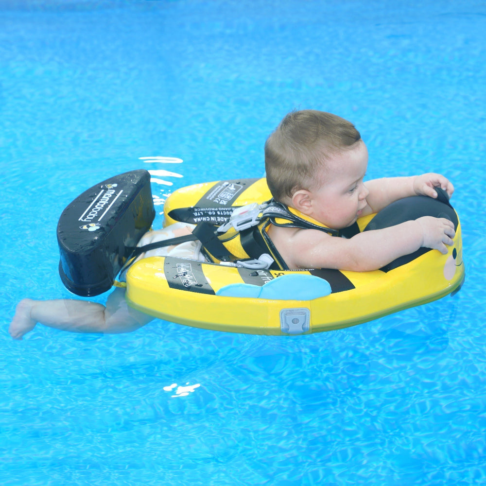 Infant swimming in a pool using the Mambobaby Bee float with a 40-degree professional horizontal safety angle.