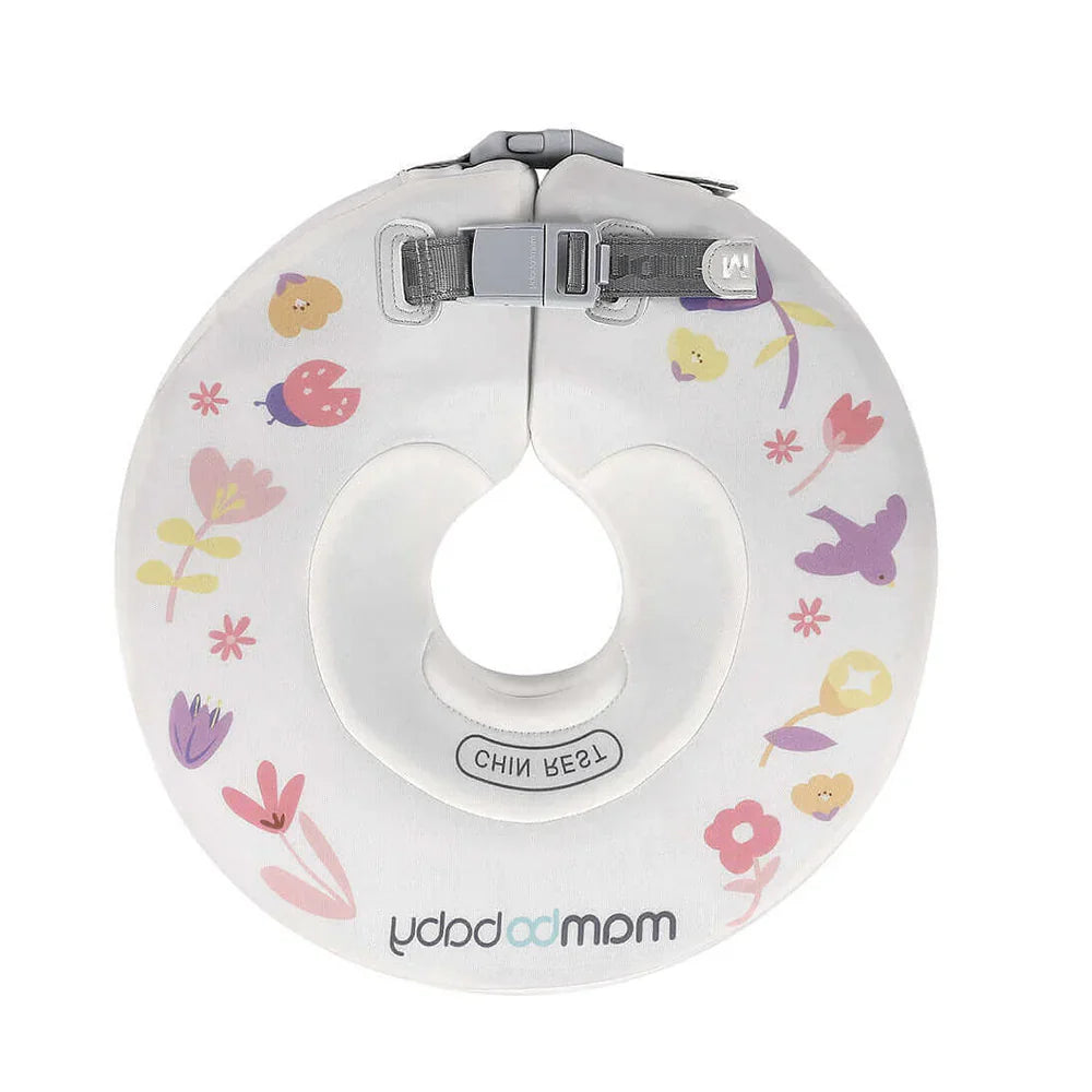 Mambobaby Donut Neck Float providing safe head support for an infant during a home baby spa hydrotherapy session.