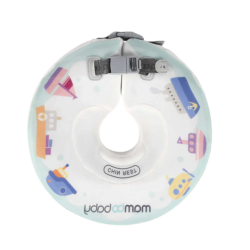 Mambobaby Donut Neck Float providing safe head support for an infant during a home baby spa hydrotherapy session green with boat.