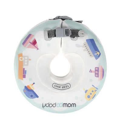 Mambobaby Donut Neck Float providing safe head support for an infant during a home baby spa hydrotherapy session green with boat.