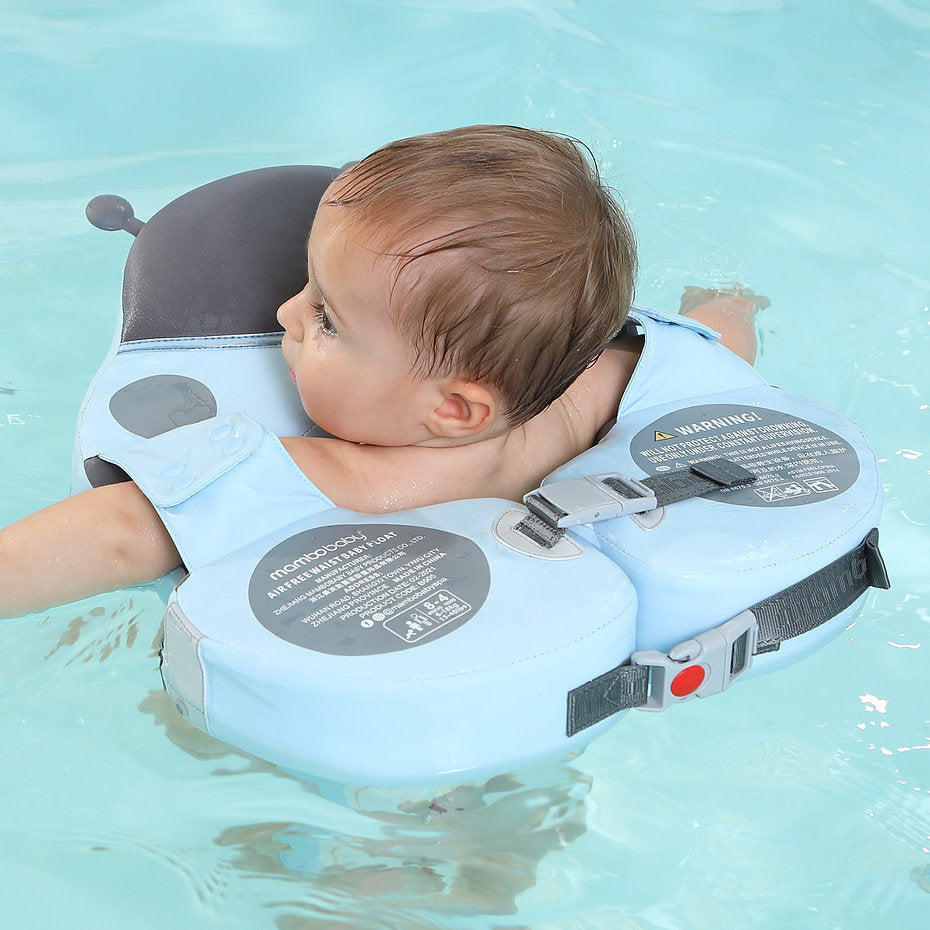 Demonstration of active swimming positions using the Mambobaby Ladybug float to promote toddler muscle coordination.