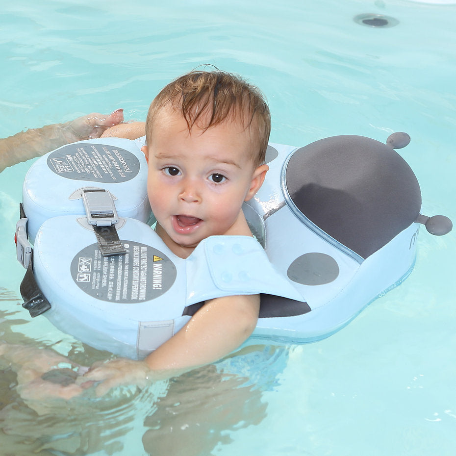 Premium product shot of the Mambobaby Ladybug shoulder float with puncture-proof PearlFoam and UV sunshade.